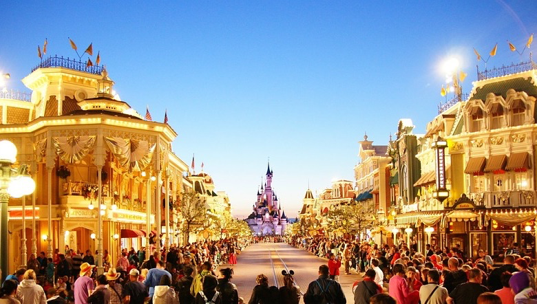 Perfect family city breaks in Europe this autumn, Disneyland Paris at night