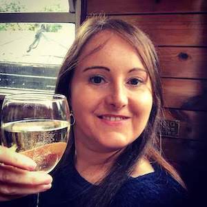September 2018 Income & Profit Report update, Corinna enjoying a glass of prosecco onboard the canal barge